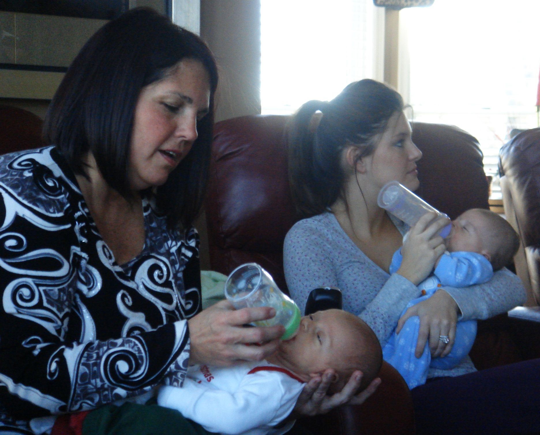 Eric with His Grandma Robin and Charlie With His Mom (Kate) Hitting the Bottle