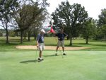 2008 TDL--Art & Tony Johnson on 18th green