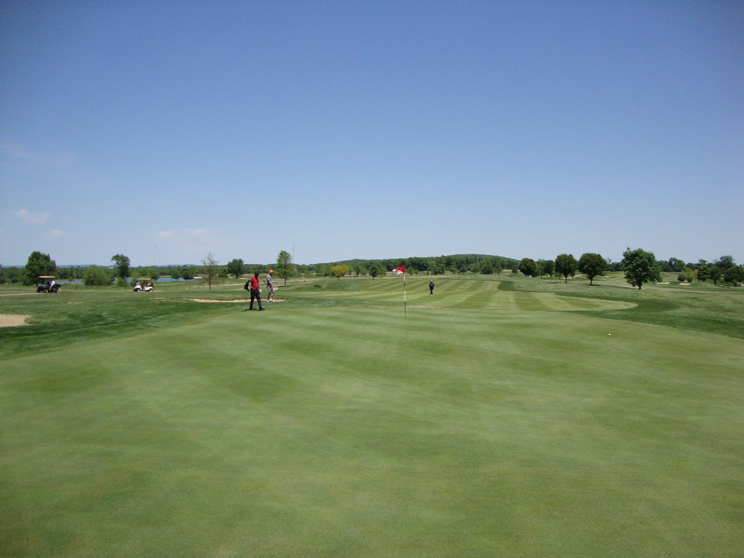 2010 Crown Pointe--Gilmore & Perulfi 18th green (morning round)--Schwalbe in fairway