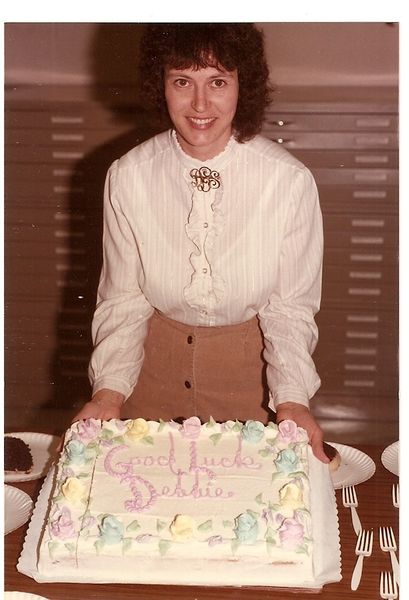 1983 Deb leaves--Debbie Lanier with cake