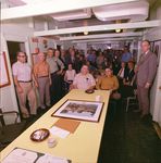 Seated (front), Captain Paul Baxter (Dredge Ste. Genevieve) and his successor, Bryan Pinkston